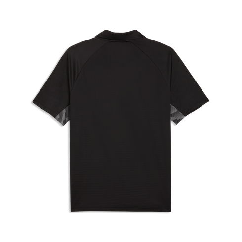 Back view of a black short-sleeved polo shirt with raglan sleeves and grey geometric patterns under the arms, set against a solid black background.