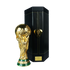 The gold FIFA World Cup trophy stands next to its black carrying case with gold hardware, against a solid black background.