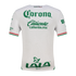 The back of a white soccer jersey with green Corona, Caliente, and LALA logos. Features Mexican flag trim on sleeves and "CHARLY" brand at the top back.