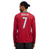 Rear view of a person in a red long-sleeved soccer jersey with "RONALDO 7" printed on the back. The person has dark braided hair and is wearing dark pants against a black background.