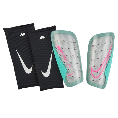 Nike Mercurial Lite shin guards featuring silver honeycomb patterns with teal and pink accents, shown alongside two black Nike mesh sleeves.