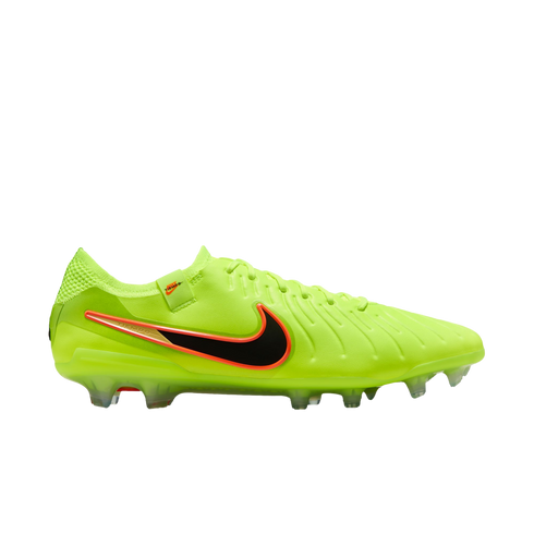 Profile view of a lime green Nike Tiempo soccer cleat with a black swoosh and orange accents, against a black background.