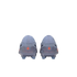 Back view of two light grey soccer cleats with small red logos on the heels, centered against a solid black background.