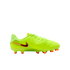Vibrant lime green Nike soccer cleat with a black and orange swoosh logo and orange studs, set against a solid black background.