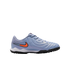 Profile view of a light purple Nike soccer turf shoe with an orange and blue Swoosh logo and a black nubbed outsole.