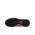 Underside of a black athletic shoe showing a textured rubber outsole with a central orange Nike logo against a solid black background.