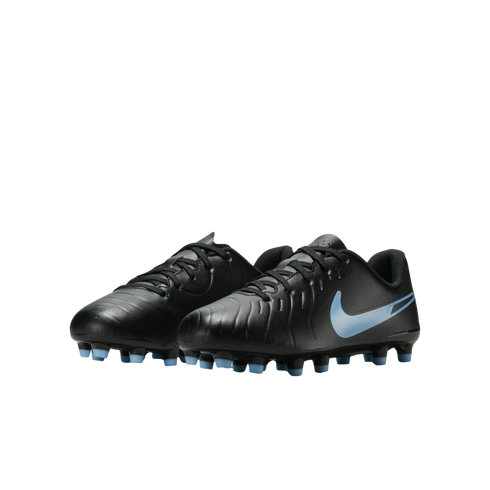 A pair of black Nike soccer cleats featuring a light blue Nike swoosh and light blue studs, set against a solid black background.