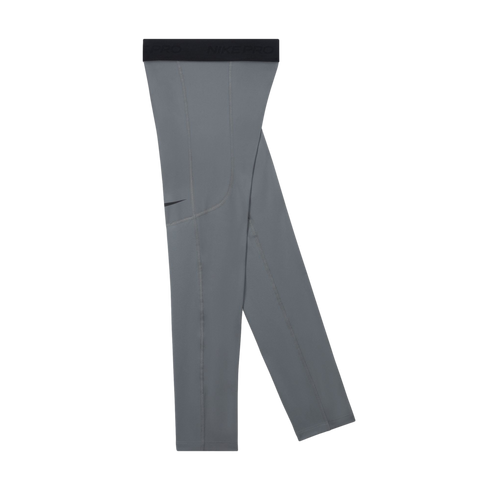 Grey Nike Pro leggings with a black elastic waistband and a small black swoosh logo on the thigh, shown against a solid black background.