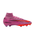 A pink Nike Air Zoom Mercurial Superfly soccer cleat with an orange sole and black swoosh, set against a black background.