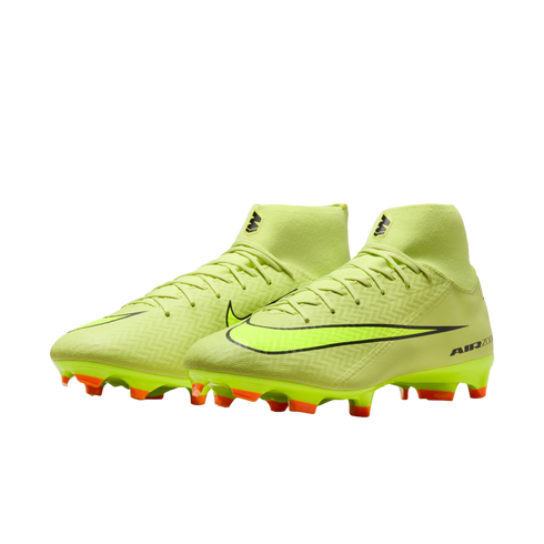 Pair of lime green Nike soccer cleats with high-top ankle collars and bright orange studs, set against a black background.
