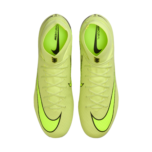 Top-down view of neon yellow Nike Mercurial soccer cleats on a black background.