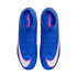 Top-down view of a pair of blue Nike Mercurial soccer cleats with large white swooshes outlined in pink, blue laces, and pink interior accents.