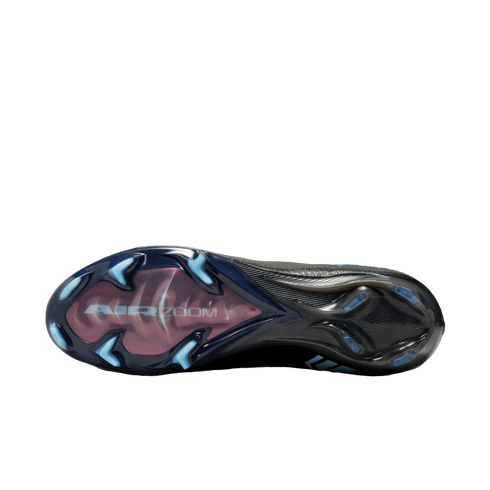 The bottom sole of a black Nike soccer cleat with blue studs and a pink window displaying "AIR ZOOM" text.