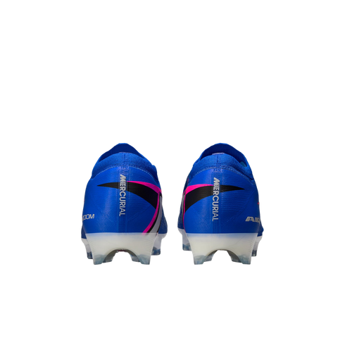 Rear view of blue Nike Mercurial soccer cleats with pink and black accents and white soles, isolated on a black background.