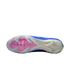 Underside of a blue soccer cleat featuring a white soleplate with a pink Air Zoom logo and clear studs.