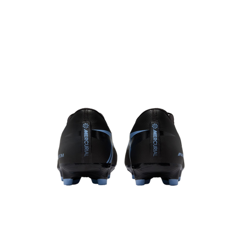 Rear view of black Nike Mercurial soccer cleats with light blue accents and studs, centered on a black background.