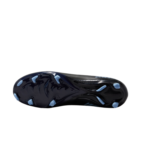 Bottom view of a navy blue soccer cleat with light blue studs against a black background.