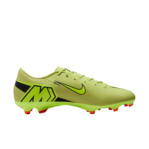 Lime green Nike Mercurial soccer cleat with a large black 'M' on the heel and red studs, isolated on a black background.