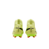 Rear view of lime green Nike Mercurial soccer cleats with orange-tipped studs on a black background.