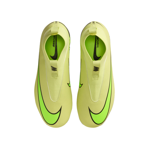 Top-down view of bright lime green laceless Nike Mercurial soccer boots on a black background, featuring large neon green Nike swooshes near the toes.