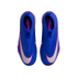 Top-down view of blue Nike Mercurial soccer shoes featuring pink accents and large silver swooshes.