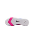 The white textured sole of a Nike shoe with a black swoosh logo and a bright pink chevron accent on the forefoot, shown against a solid black background.
