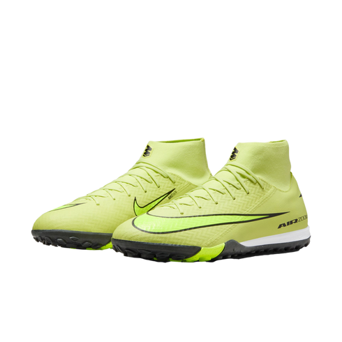 A pair of neon yellow Nike Air Zoom soccer shoes with black accents and a high-top collar, set against a black background.