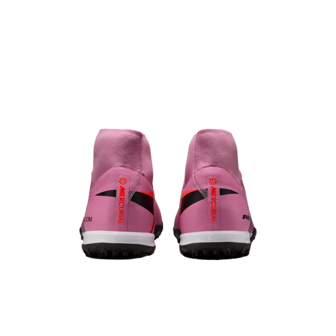 Rear view of pink Nike Mercurial soccer cleats with high-top collars and black and orange accents, shown against a solid black background.