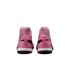 Rear view of pink Nike Mercurial soccer cleats with high-top collars and black and orange accents, shown against a solid black background.