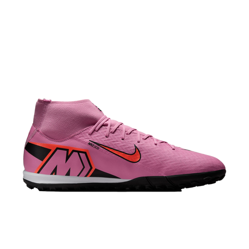 Pink Nike soccer shoe with a high-top collar, orange swoosh, and large "M" logo on the heel, set against a black background.