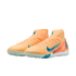 Pair of light orange Nike soccer turf shoes with blue Nike swoosh logos and high-top sock collars.