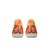 Rear view of orange Nike Mercurial indoor soccer shoes featuring black diagonal stripes, white soles, and high collars against a black background.