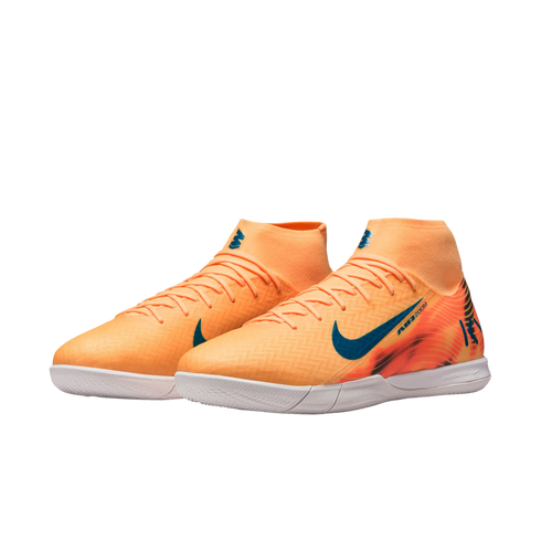 A pair of orange and blue Nike Mercurial Air Zoom indoor soccer shoes with a high-top sock collar and white rubber soles.