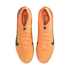 Top-down view of a pair of bright orange Nike soccer cleats with teal swooshes and laces, isolated on a black background.