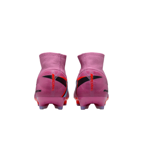 Rear view of two pink Nike Air Zoom Mercurial soccer cleats with red branding on the heels against a black background.