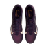 Top-down view of purple Nike soccer cleats with large white swooshes and gold interior accents on a white background.