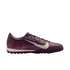 Purple iridescent Nike Mercurial Mbappé turf soccer shoe with a white swoosh and graphic "M" logo, viewed from the side on a white background.