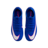 Top-down view of blue Nike Mercurial soccer cleats with white swoosh logos outlined in pink.