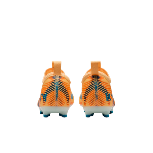 Rear view of orange and blue Nike Mercurial football boots with white soles and 'KM' branding, set against a solid black background.