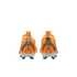 Rear view of orange and blue Nike Mercurial football boots with white soles and 'KM' branding, set against a solid black background.