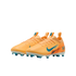 A pair of orange Nike Air Zoom soccer cleats with blue accents and studs, set against a black background.