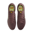 Top-down view of a pair of purple soccer cleats with yellow KM AIR logos on the tongues and insoles.