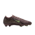Side view of a maroon Nike soccer cleat with a lime green swoosh and gold patterned accents on the heel, set against a black background.