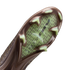Close-up of the sole of a brown soccer cleat with pale green studs and a translucent green central panel featuring "AIR ZOOM" branding against a black background.