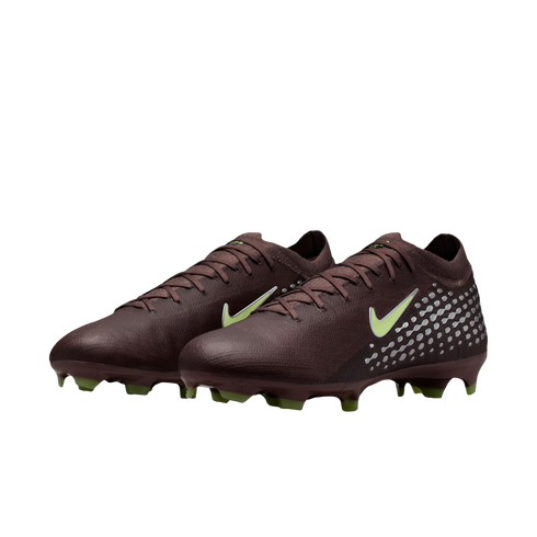 A pair of dark brown Nike soccer cleats with lime green accents and a silver dot pattern on the heel, set against a black background.