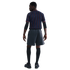 A full-body rear view of a model wearing a dark pinstriped jersey, black athletic arm sleeves, charcoal gray athletic shorts, black knee-high socks, and black sneakers against a white background.