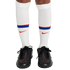 Person wearing white Nike soccer socks with red and blue stripes and black Nike soccer shoes with red-outlined logos.