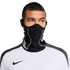 A man wearing a black Nike neck warmer with white accents over his face and a white Nike athletic shirt, set against a solid black background.