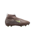 A taupe Nike soccer cleat with a lime green swoosh and studs, featuring a silver-dotted pattern on the heel against a black backdrop.