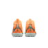 Rear view of two orange Nike Mercurial turf soccer shoes featuring blue accents and KM logos on the heels.